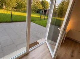 Moderne Terrassenwohnung mit privatem Eingang