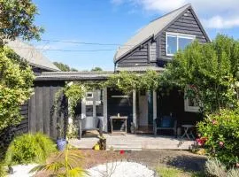 The Black Cottage at Putiki Bay