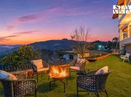 StayVista at Amulyam villa with Lawn & Bonfire