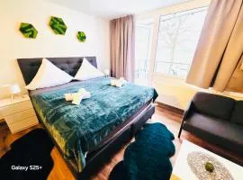 Ferienwohnung Harmonia inklusive Hallenbad, Außenpool, Sauna & Fitnessstudio, familienfreundlich ausgestattet, großes 2-Zimmer-Apartment
