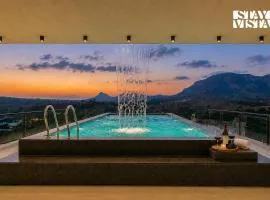 StayVista at Majestic Whispers with Rooftop Pool