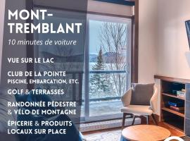 Condo overlooking Lac Superieur & mountain views, hotel i Lac-Superieur