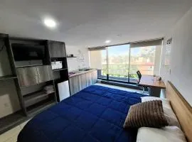 S09 SUITE KING Premium Suite TEC CEM Cocineta WiFi Balcón Parking Terraza