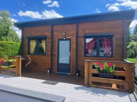 Chalet 2 personnes avec jacuzzi privatif et piscine saisonnière partagée, hotel a Corcieux