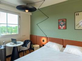 ibis Strasbourg Aéroport Le Zénith、ランゴルサイムのホテル