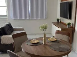 2- Apartamento aconchegante com garagem 1200m do centro