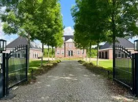 Het Koetshuis
