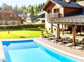 Chalet Schäfer s vyhřívaným bazénem se slanou vodou a saunou