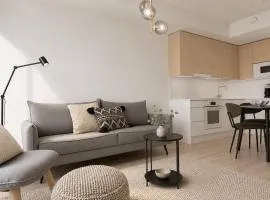 Quiet 10th floor apartment with balcony, next to train station