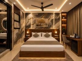 Hotel NYZ Balla Mont Suite Near Delhi IGI Airport - Free Airport Pick Up & Drop، فندق في نيودلهي