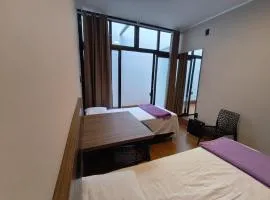 Quarto novo no coração da cidade
