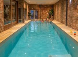 MG Suites & Infinity, hotel u gradu Ravels