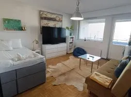 stay near airport and center and train station and always public transport and self check it with private room with glass balcony