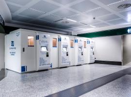 Resting Pods - -ZZZleepandGo MXP Airport, capsule hotel in Ferno