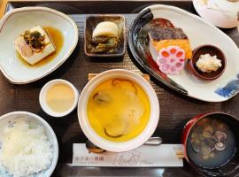 Hotel Ikkeikaku, hotel en Kesennuma