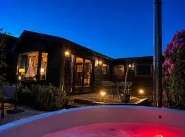 Het huisje aan het water in Loosdrecht Hottub & Sauna