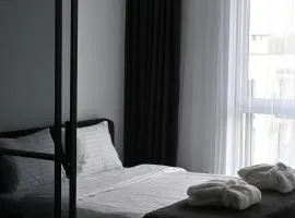 Modern Dark Minimalist Apartment with Panoramic Views