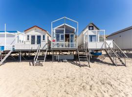 Welcome in - Slaapstrandhuisje I Strand dishoek 37, met zeezicht en terras – hotel w mieście Koudekerke