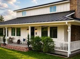 Farmhouse with pool, hot tub, turf putting green, views, swimming hole