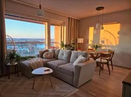 Bright 16th floor home view, sauna and peace