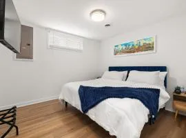 Basement Suite Downtown- King Bed- Walk to Chavis Park- Splash Pad-Food Hall