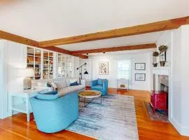 Elegant home right in town with gorgeous water view, deck & interior