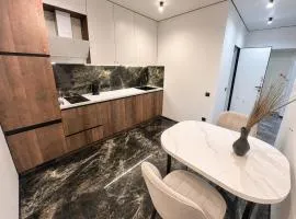 Стильні апартаменти в районі автовокзалу ЖК Great House Парковка