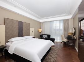 Metropolo Hotel Zhenjia Wanda Plaza Railway Station, hotell i Zhenjiang