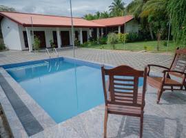 Chamee Oasis Villa, hotel a Ranna