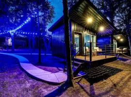 Enchanted Woodland Cabins by the Mountain in Texas with Private Pond and Scenic Trails