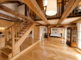 Historic penthouse loft with fortress view