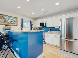 Coastal canalfront home with swim spa, dock, kayaks, e-bikes & dog friendly