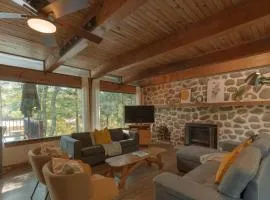 Riverfront Getaway with Hot Tub and Scenic Views