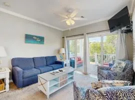 Charming townhome with ocean views, an open porch & steps from the water