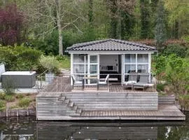 Wellness lodge - Slapen aan het ven