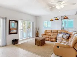 Waterfront Half-Duplex with 30-Ft. Dock, Sitting Pool, and Private Beach Access