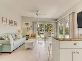 Waterfront home with 24-foot dock, shared pool, & beach access