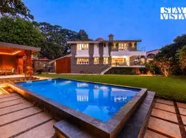 StayVista's House Of J - Embrace Leisure with Lawn, Pool, and Gazebo