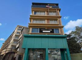 Super Townhouse Oak Siliguri Formerly Palm Tree Lodge, Hotel in Shiliguri