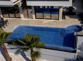 Luxury Villa with Pool & Panoramic Sea Views