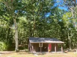 Charming Cabin Retreat with Porch & Firepit Nights in Voluntown, Connecticut