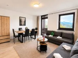 Moderne Ferienwohnung mit Balkon & Bergblick im Bayerischen Wald nahe Arber