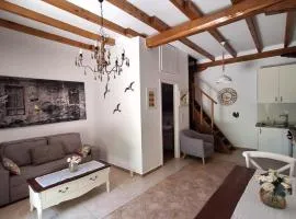 Casa di Sofiana by wood and stone