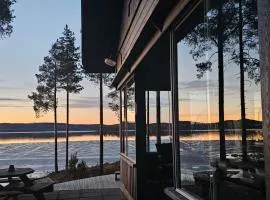 Mökki järven rannalla, Matkailukartano Kivennapa