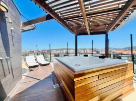 Alto Padr&atilde;o vista lateral mar Jacuzzi privativa e piscina no condom&iacute;nio, hotell i Cabo Frio