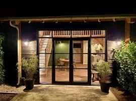 Vrijstaand gastenverblijf met privé tuin nabij Nijmegen
