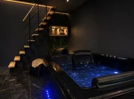 Éclipse - Loft Romantique - Jacuzzi - Cinéma Privé