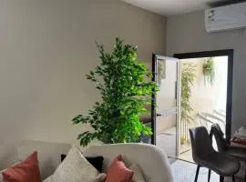 Luxury 3-bedroom apartment with a balcony and a direct view of Olaya Street