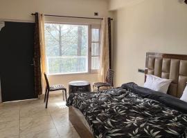 Him Shangrila Cottages: Jūnga şehrinde bir otel