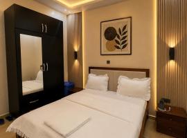 KIGALI E6 APARTMENT WITH SWIMMING POOL AND TOUR SERVICEs – hotel w mieście Kigali